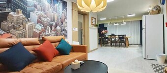 Hongdae: Spacious yard, group-friendly. Green, sunny, near biz—cozy