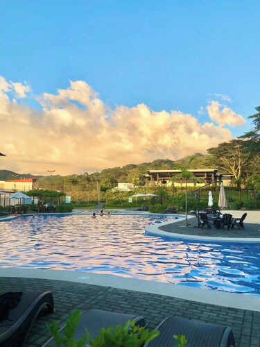 Family condo with resort-style pools, close to beaches, nature and adventure.
