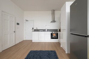 Fridge, microwave, oven, coffee/tea maker