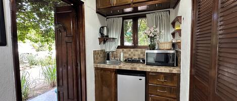 Fridge, microwave, stovetop, coffee/tea maker