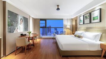 Habitación Prestigio | Cortinas blackout, insonorización y tabla de planchar con plancha