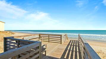 On the beach, sun-loungers