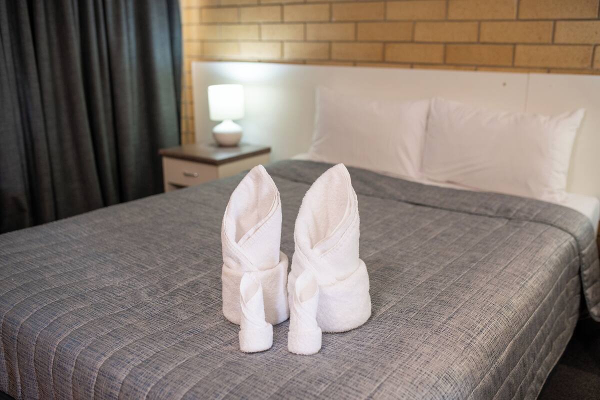 Deluxe Double Room, Pool View | Desk, laptop workspace, iron/ironing board, free WiFi