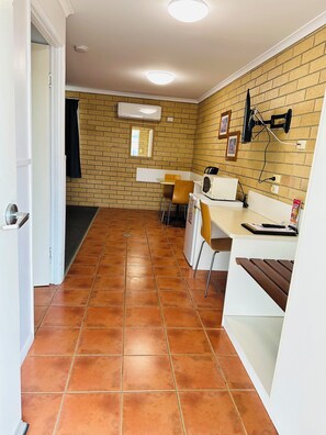 Deluxe Double Room, Mobility Accessible | Desk, laptop workspace, iron/ironing board, free WiFi
