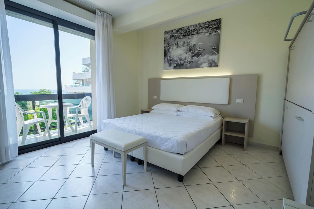 Comfort Quadruple Room, Balcony | Egyptian cotton sheets, premium bedding, down comforters, in-room safe