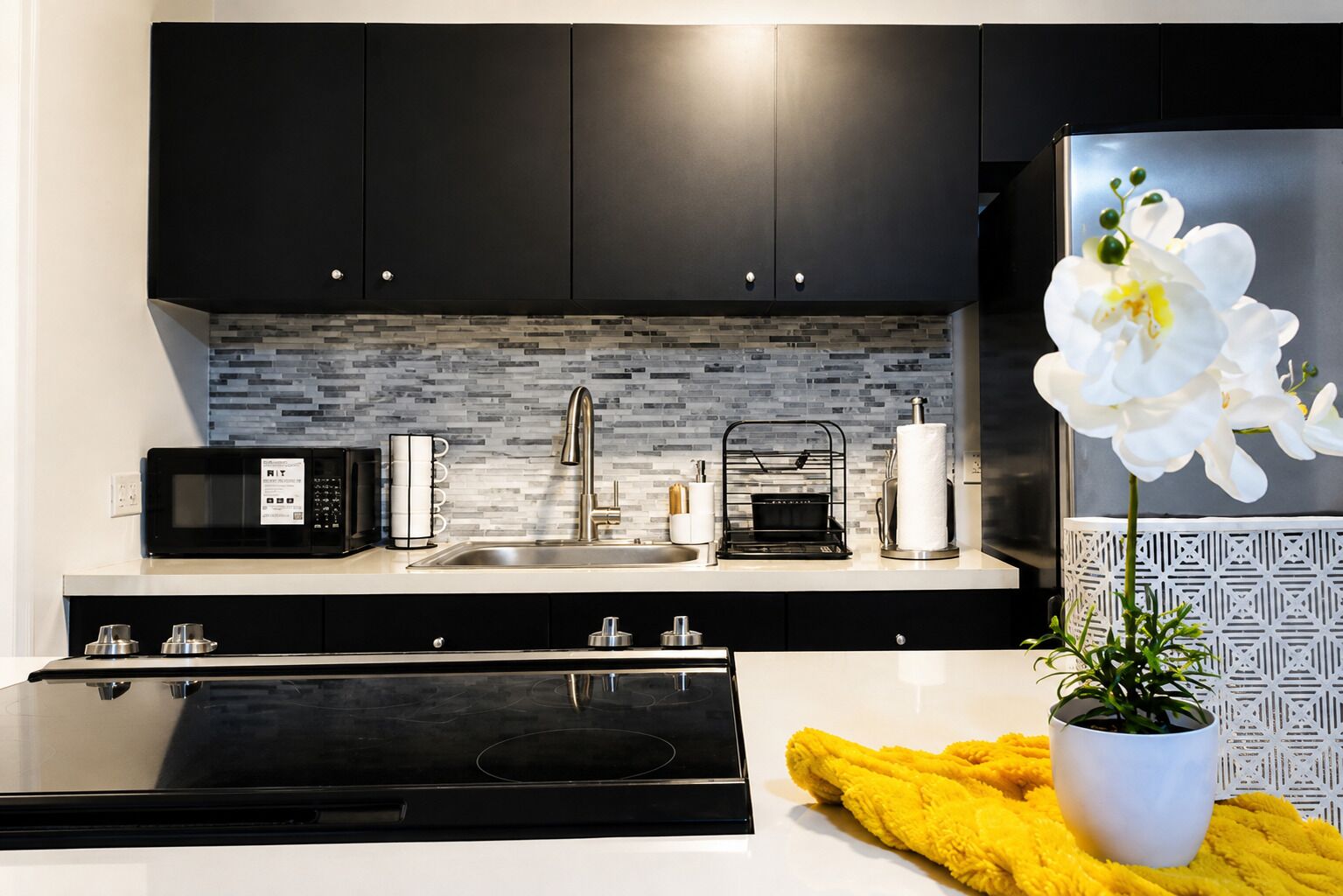 Coffee/tea maker, fridge, microwave, oven