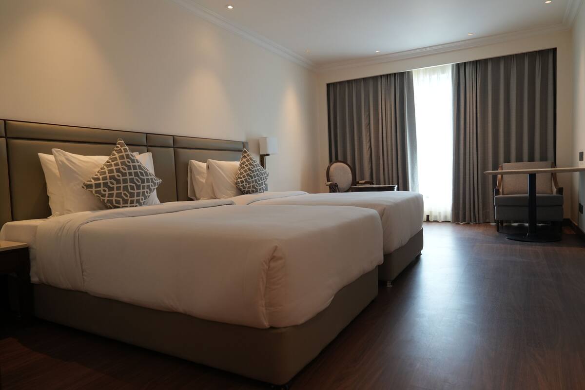 Deluxe Twin Room | Blackout drapes, iron/ironing board, free WiFi