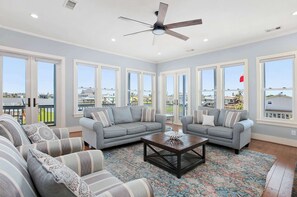 Smart TV, fireplace, books, offices