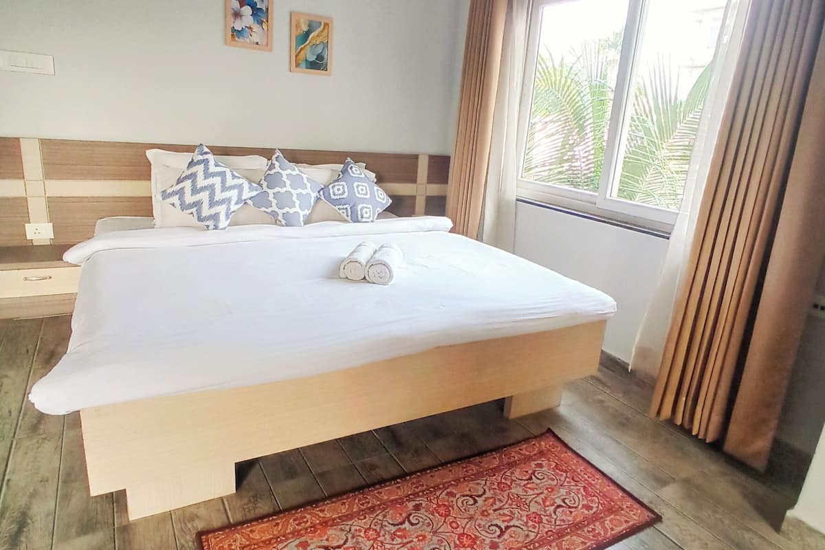 Habitación doble de lujo, vista al jardín | Wifi gratis