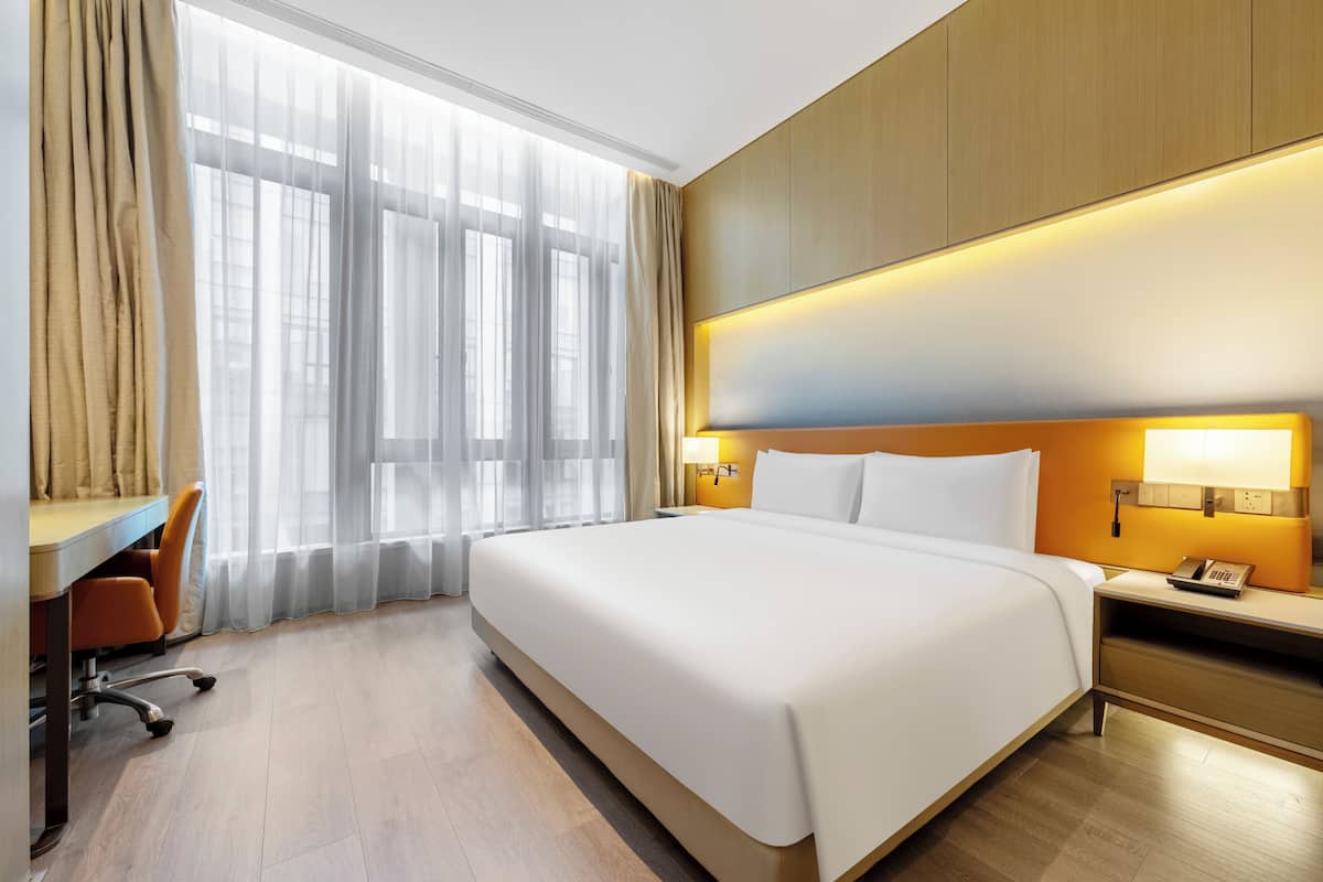 Deluxe Double Room | Blackout drapes, iron/ironing board, bed sheets