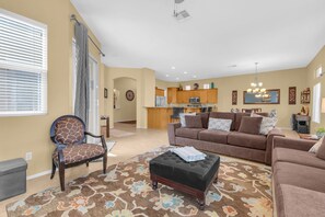 Smart TV, fireplace, books, stereo
