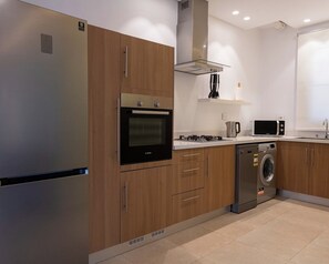 Apartment, Balcony, City View | Private kitchen