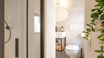 Hair dryer, towels, soap, toilet paper