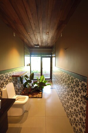 Superior Suite, Balcony, Pool View | Bathroom | Free toiletries, slippers, towels, soap