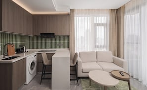 Executive One-Bedroom Apartment | Private kitchen | Mini-fridge, coffee/tea maker, electric kettle