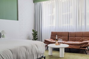 1 bedroom, desk, iron/ironing board, travel crib