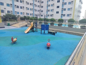 Condo, 1 Bedroom, Accessible, Private Pool | Children’s area - Modern Condo in Quezon City With City View (Quezon City)