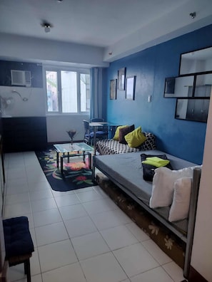 Condo, 1 habitación, con acceso para personas discapacitadas, alberca privada | Sala de estar