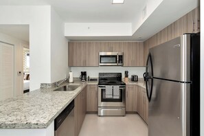 Fridge, microwave, stovetop, dishwasher - Roami at Grove 27 | Coconut Grove | 1BR (Miami)