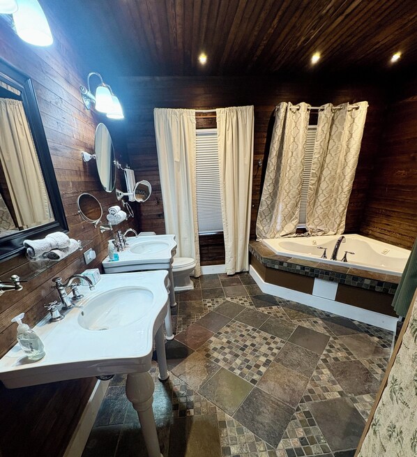 Shower, jetted tub, eco-friendly toiletries, hair dryer