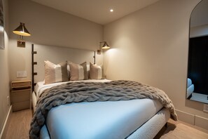 1 bedroom, desk, iron/ironing board, travel crib