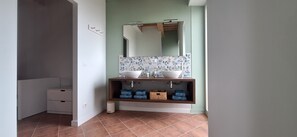 Shower, hair dryer, towels, toilet paper