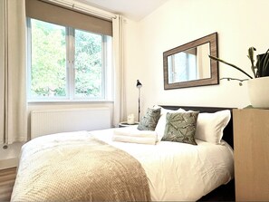 2 bedrooms, desk, iron/ironing board, travel cot