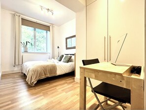 2 bedrooms, desk, iron/ironing board, travel crib