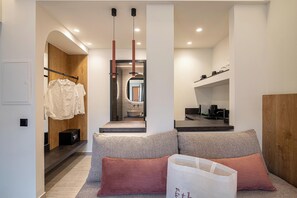 Superior Suite, City View | Living area | 40-inch Smart TV with cable channels