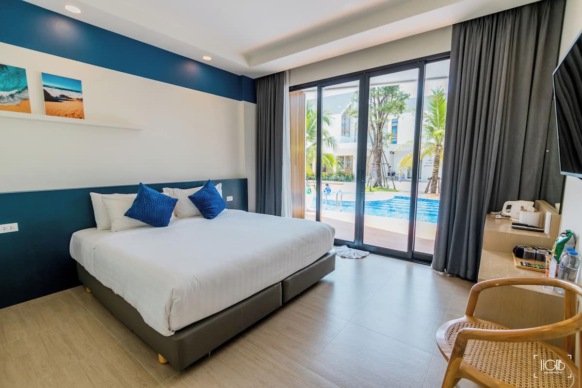 Deluxe Double Room, Balcony, Pool View | Desk, free WiFi