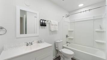Hair dryer, towels, soap, toilet paper