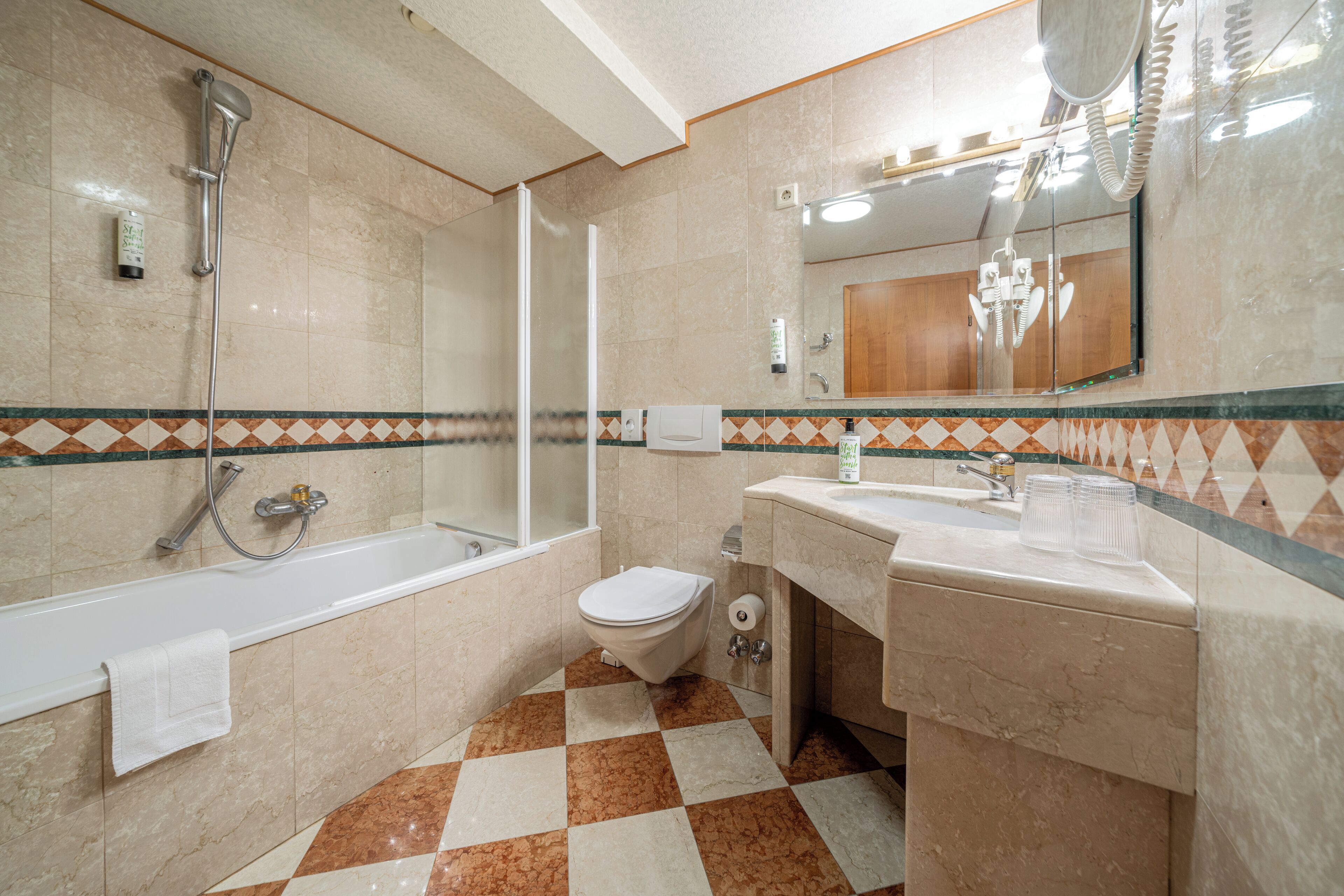 Triple Room, City View | Bathroom | Hair dryer, towels, soap, shampoo