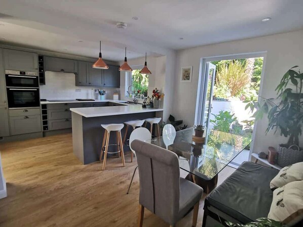 Fridge, stovetop, cookware/dishes/utensils