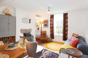 TV, fireplace, books, offices