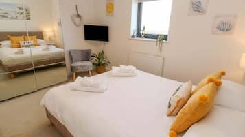 1 habitación, tabla de planchar con plancha, cuna de viaje y wifi