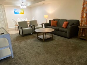 Living room open to the dining area - Friends & Family Retreat|Epic Game Room|Pets too (Orem)