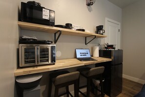 Fridge, microwave, stovetop, coffee/tea maker