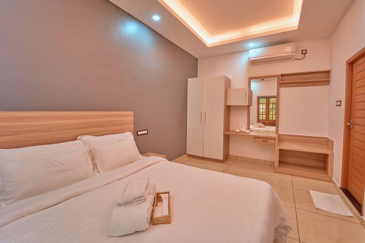 Premium Villa | Lit avec matelas à plateau-coussin