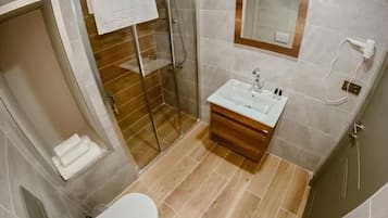 Family Quadruple Room | Minibar, in-room safe, free WiFi, bed sheets