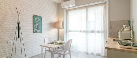 Apartment, Balcony | Private kitchen | Coffee/tea maker, electric kettle