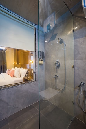 Apartment, 1 King Bed, Balcony, Hill View | Bathroom | Shower, free toiletries, slippers, towels