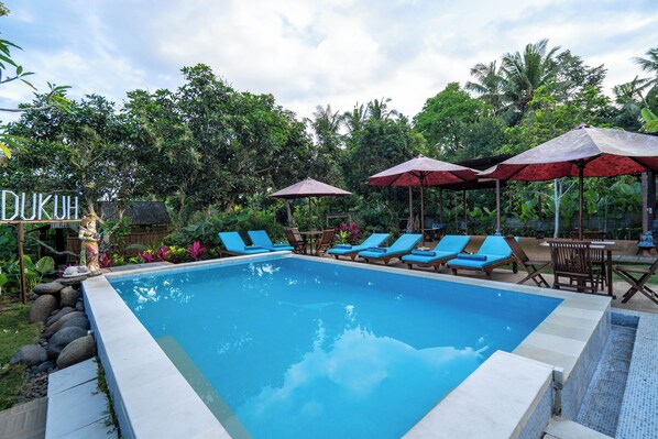 Outdoor pool, pool umbrellas, pool loungers