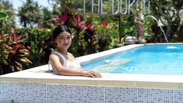 Outdoor pool, pool umbrellas, sun loungers