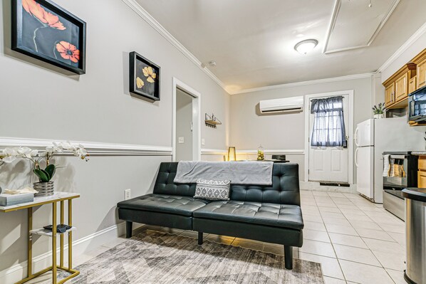 Apartment (0 Bedroom) | Living area | TV