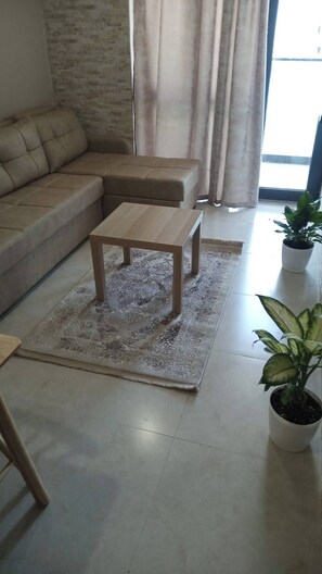 Apartamento, 2 quartos, acessível, para fumantes | Sala de estar