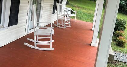 Charming 3-bedroom farmhouse with 2 full baths in a quiet country setting.