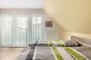 1 habitación, tabla de planchar con plancha, wifi y ropa de cama 