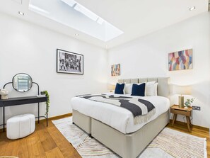 1 bedroom, desk, iron/ironing board, travel cot