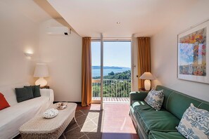 Apartment, Sea View | Living area | 30-cm TV with satellite channels - Orizzonte Blu with Terrace by Wonderful Italy (Santa Margherita Ligure)
