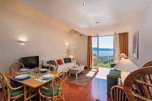 Apartment, Sea View | Living area | 30-cm TV with satellite channels - Orizzonte Blu with Terrace by Wonderful Italy (Santa Margherita Ligure)